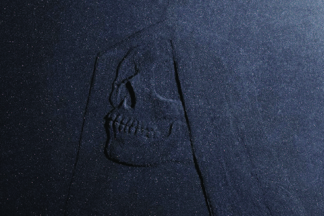Painting of a veiled skull.