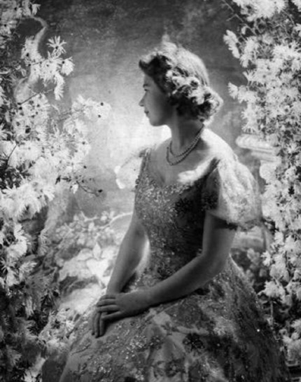 photo features Princess Elizabeth, later Queen Elizabeth II, in a Norman Hartnell gown at Buckingham Palace in 1945